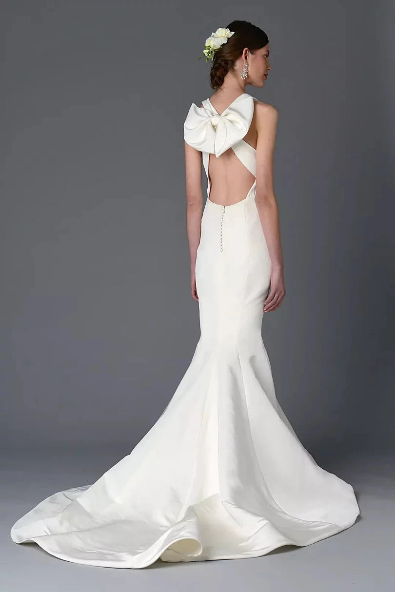 Luxurious Satin Mermaid Halter Deep-V Bow-Back Train Wedding Dress by YiHuiw