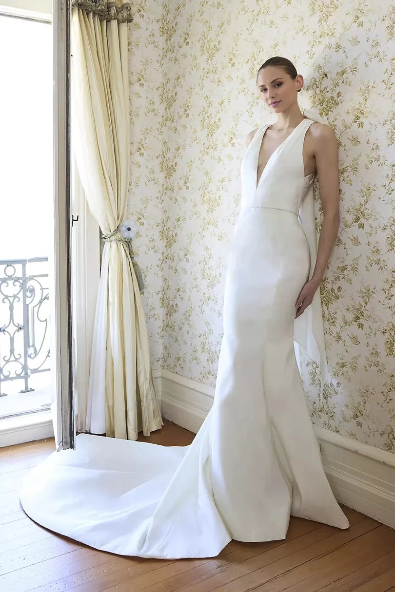 Luxurious Satin Mermaid Halter Deep-V Bow-Back Train Wedding Dress by YiHuiw