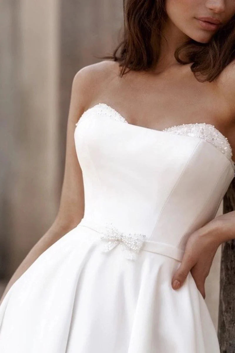 Luxury Ivory Satin Strapless Sweetheart Neck A-Line Wedding Dress with Cathedral Train & Delicate Lace Trim