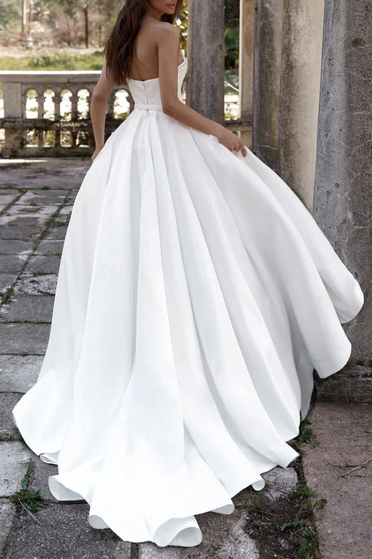 Luxury Ivory Satin Strapless Sweetheart Neck A-Line Wedding Dress with Cathedral Train & Delicate Lace Trim by YiHuiw
