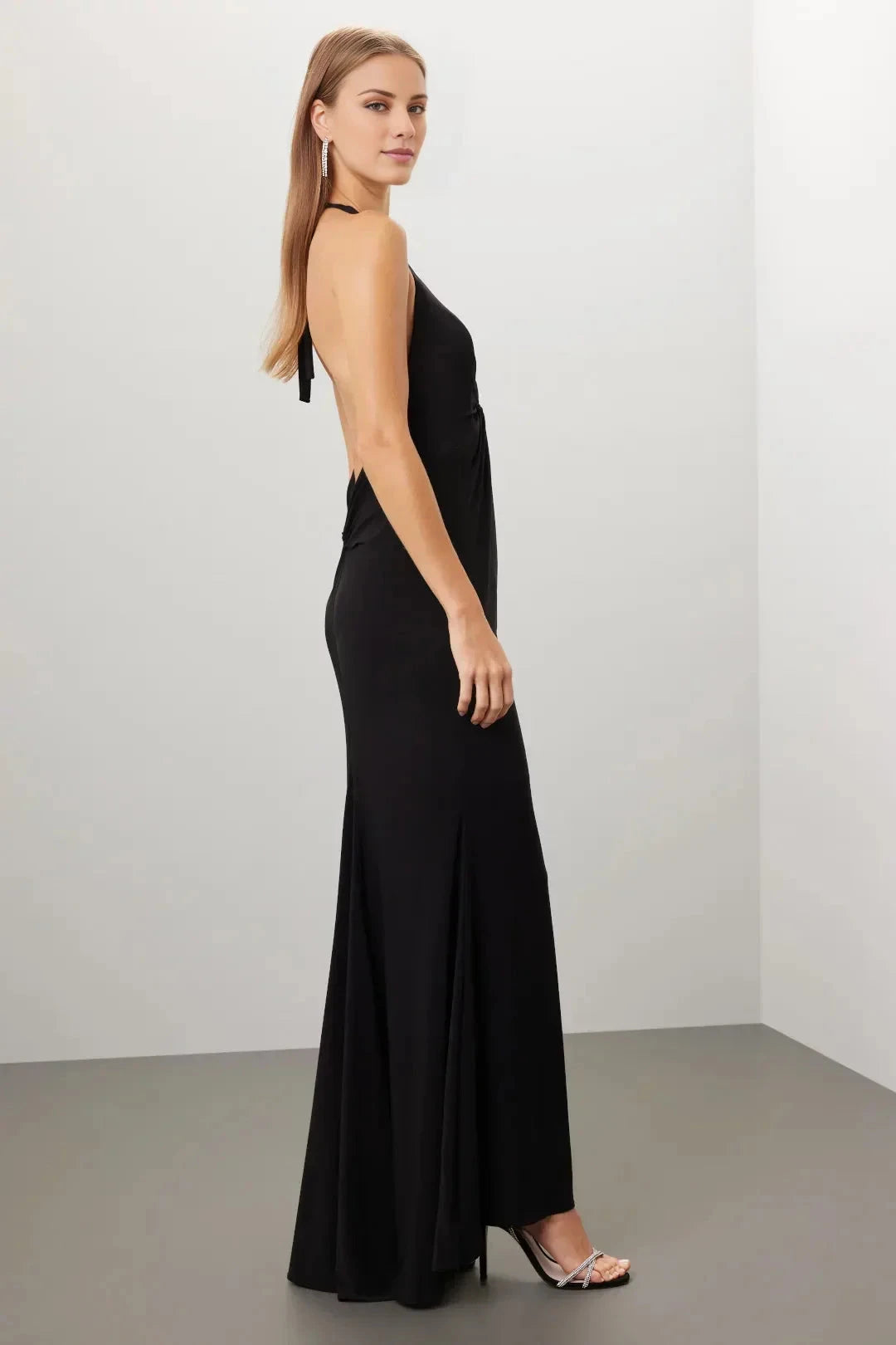 Minimalist-Lux A-Line Halter Neck Sleeveless Knot-Front Open-Back Floor-Length Evening Dress by YiHuiw