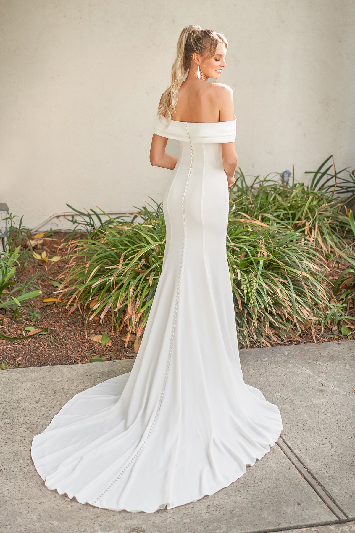 Modern Crepe Mermaid Off-the-Shoulder Cowl-Neck Ruched-Bodice Button-Detail Train Wedding Dress by YiHuiw