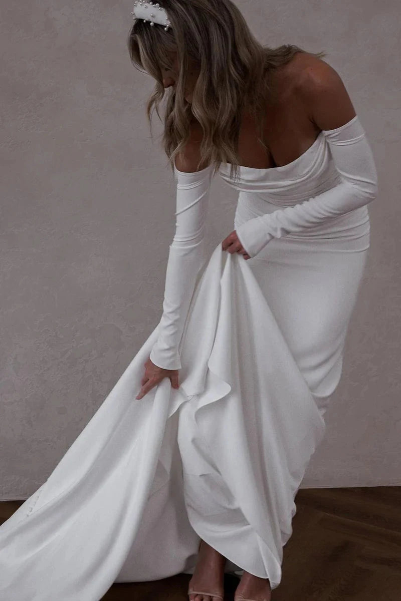 Off-the-Shoulder Long Sleeve Satin Mermaid Wedding Dress with Cathedral Train & Pearl Buttons by YiHuiw