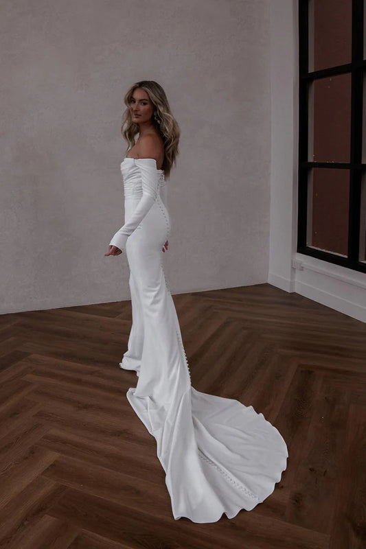 Off-the-Shoulder Long Sleeve Satin Mermaid Wedding Dress with Cathedral Train & Pearl Buttons