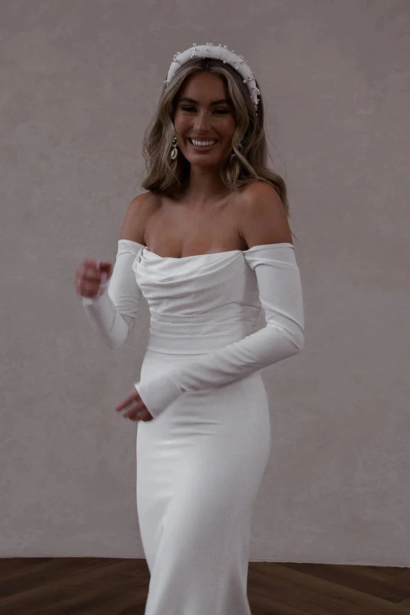 Off-the-Shoulder Long Sleeve Satin Mermaid Wedding Dress with Cathedral Train & Pearl Buttons by YiHuiw