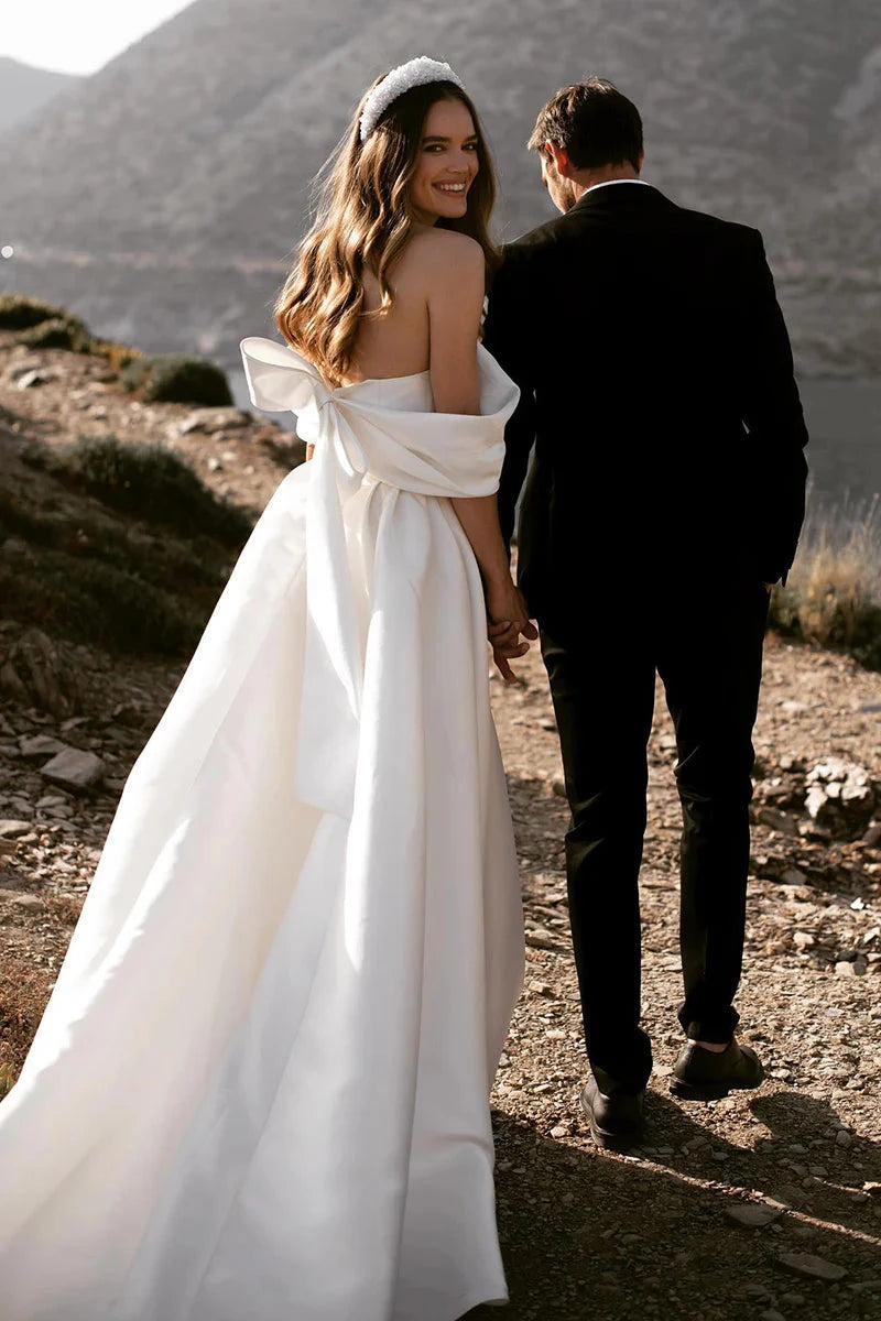 Off-the-Shoulder Satin A-Line Wedding Dress with Oversized Back Bow & Chapel Train by YiHuiw