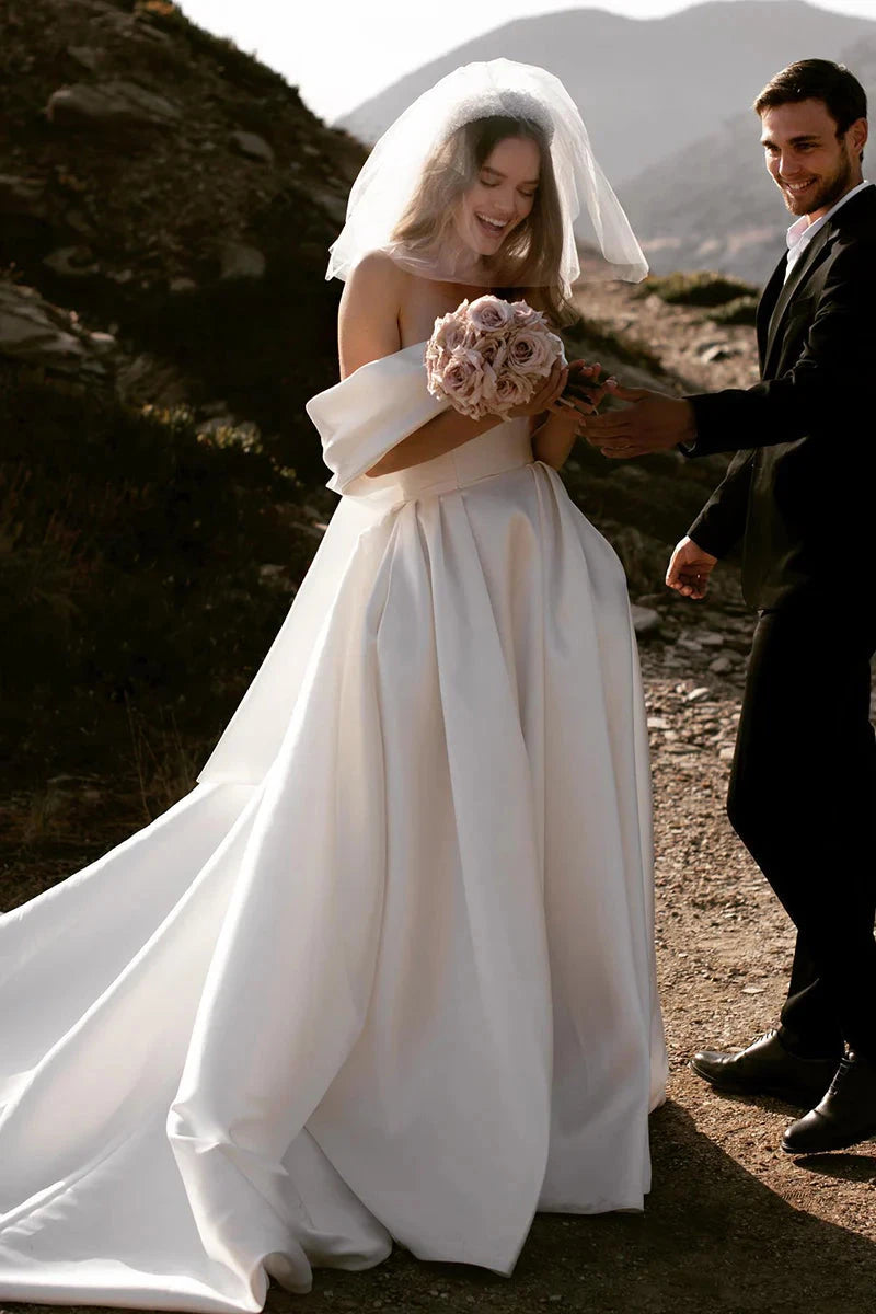 Off-the-Shoulder Satin A-Line Wedding Dress with Oversized Back Bow & Chapel Train by YiHuiw