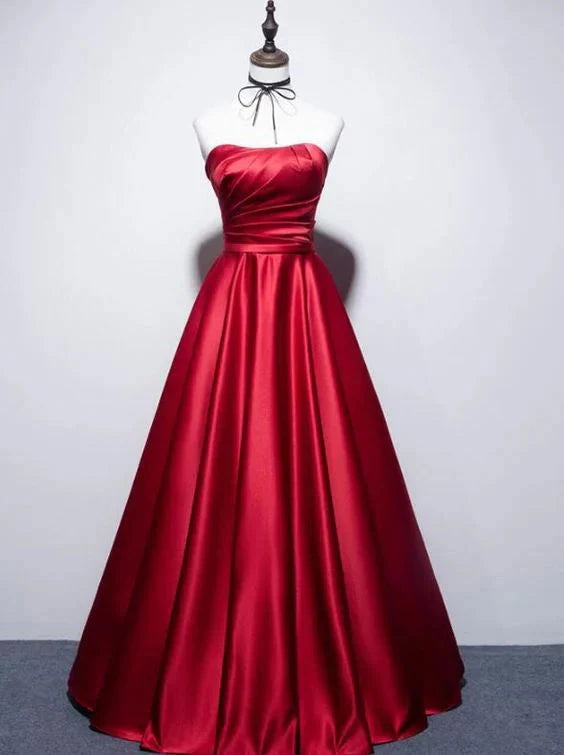 Red satin strapless dress with pleated upper design, high waist and large skirt suitable for dinners and parties by YiHuiw