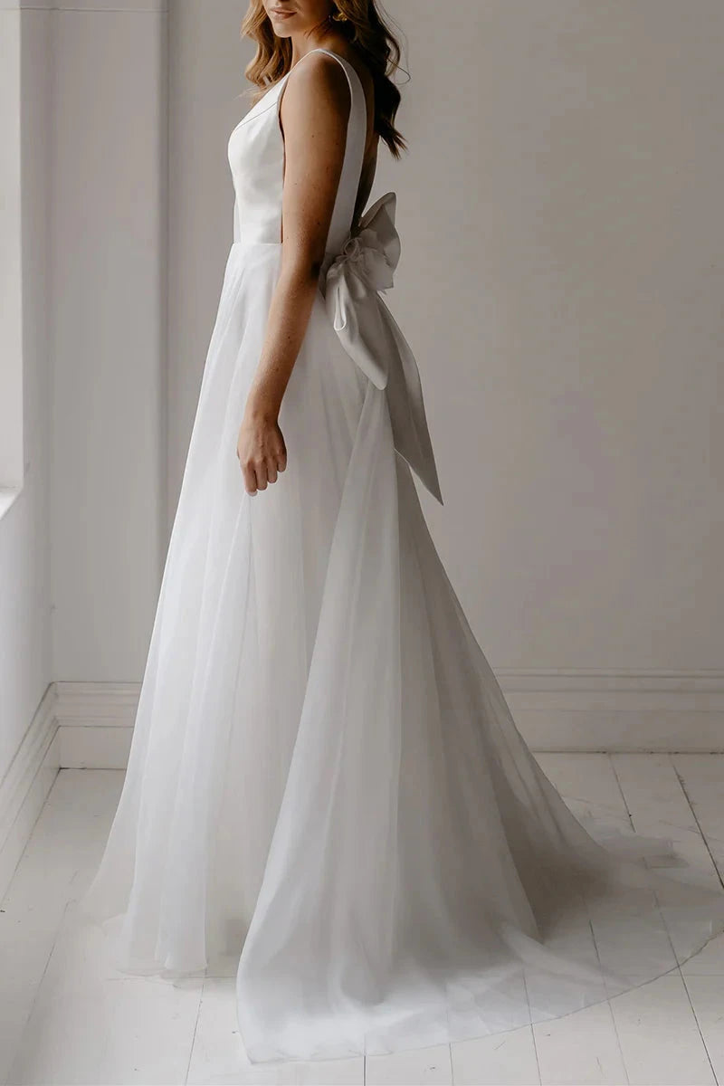 Romantic Chiffon A-Line Deep-V Open-Back Oversized-Bow Train Wedding Dress by YiHuiw