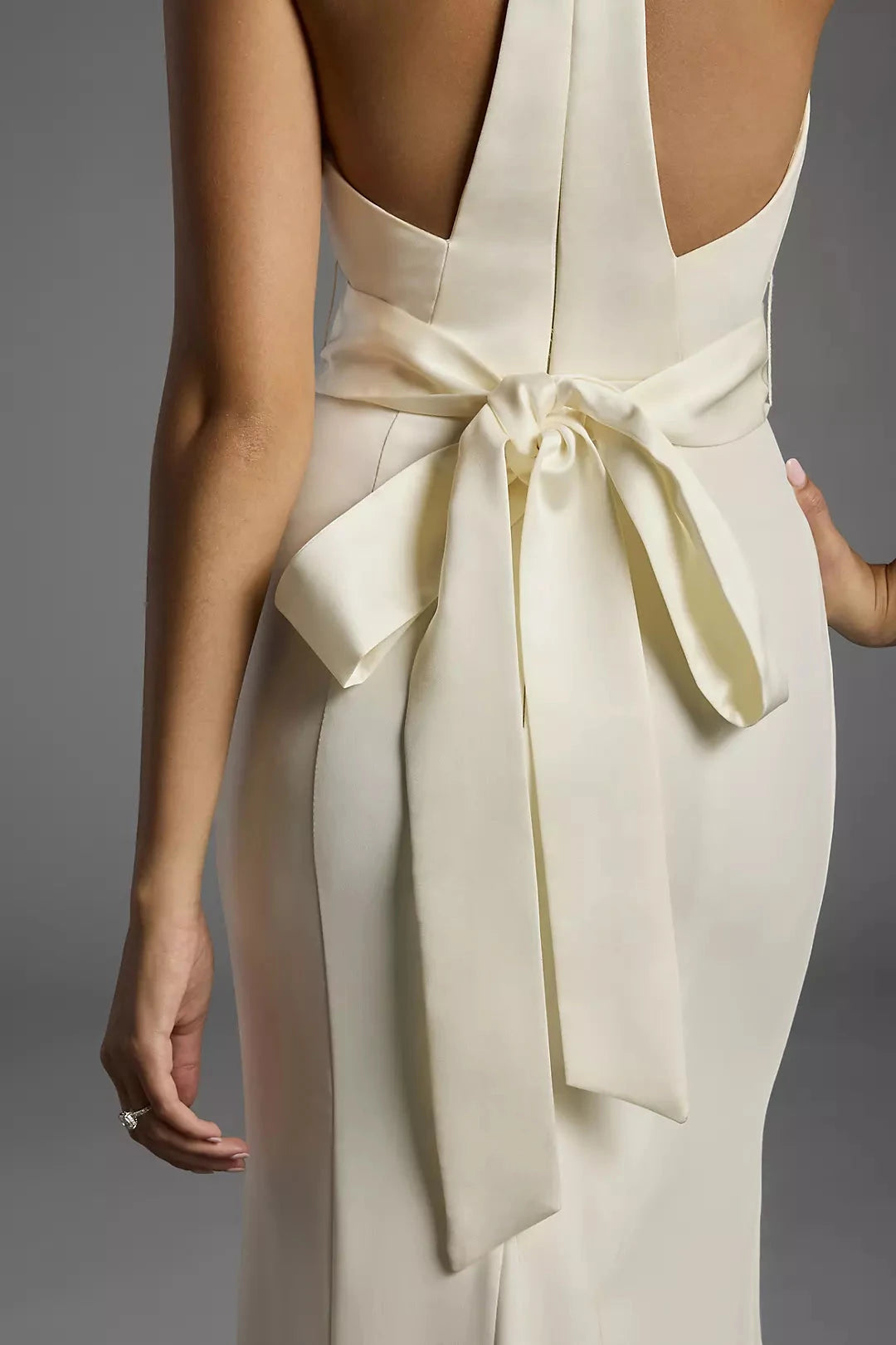 Sleek Mermaid Halter Sleeveless Cut-Out Back Train Wedding Dress by YiHuiw