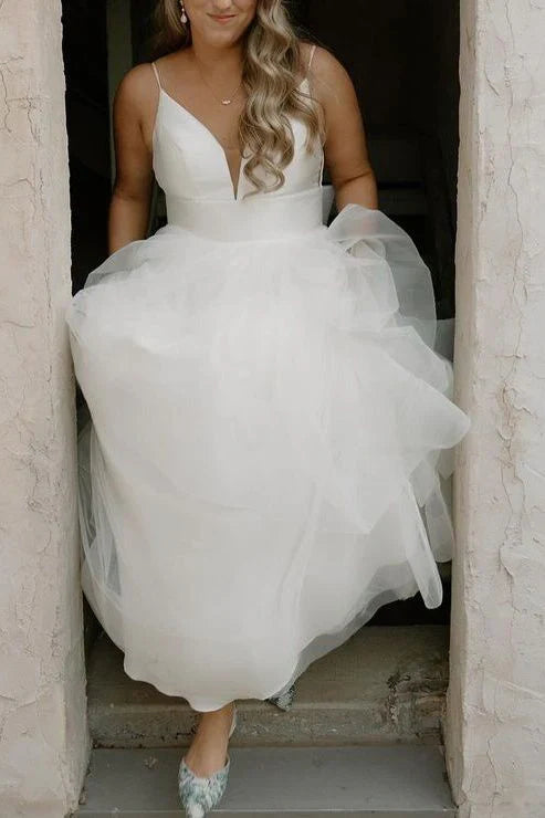 Spaghetti Strap Tulle Wedding Dresses with Deep V-Neck, Oversized Back Bow and Ruffled Tiered Skirt Bridal Dress