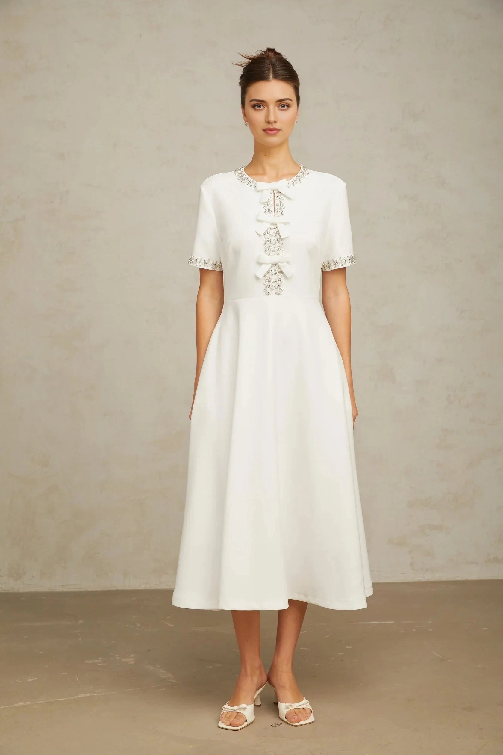 White Crystal - Embellished Bow - Front Midi Dress Cassiopeia crystal-accented bow midi dress in White Evening Dress by YiHuiw