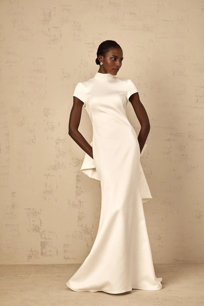 White High Neck Open Back Maxi Dress with Bow Detail Camille White Statement Bow Mermaid Maxi Dress Evening Dress by YiHuiw