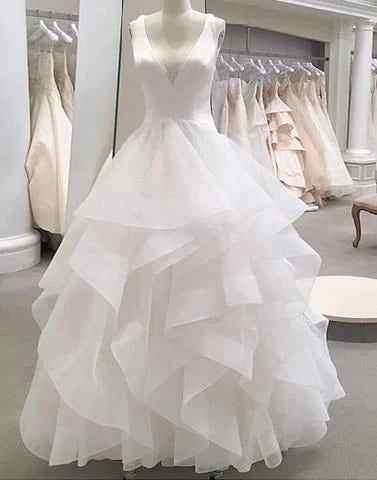 White deep V-neck sleeveless design with high waisted multi-layer organza skirt, by YiHuiw
