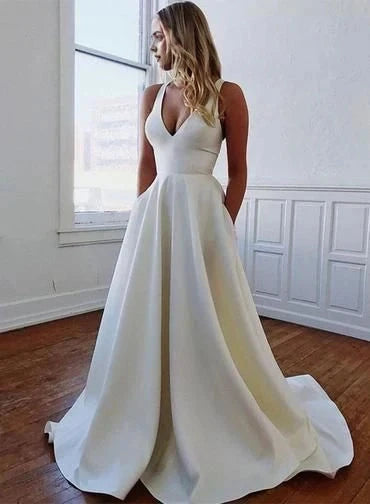 White deep V-neck sleeveless dress, with a deep V-neck cinched at the waist to highlight the figure, suitable for weddings, dinners, etc by YiHuiw