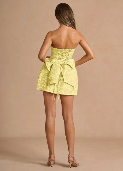 Yellow Strapless Jacquard Mini Dress with Lace - Up Back and Bow Detail Hadleigh Yellow Mini Dress Homecoming Dresses by YiHuiw