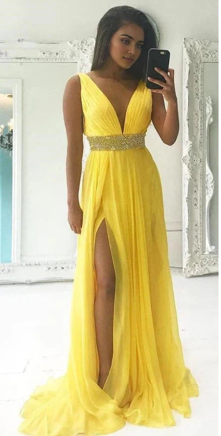 Yellow long sleeveless dress with deep V-neckline suitable for dinners, dances, parties, etc by YiHuiw