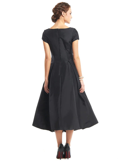 A-Line Black Dress Vintage Homecoming Wedding Guest Tea Length Short Sleeve Boat Neck Taffeta with Buttons by YiHuiw